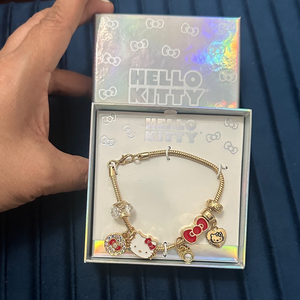 Sanrio Hello Kitty Gold and Red Charm Bracelet red and gold tone